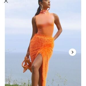 Fashion Nova Asymmetrical Orange skirt with shimmery matching top